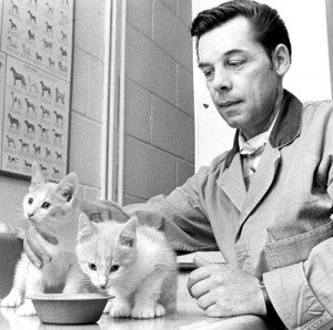 Joseph Clauthier feeds two kittens April 30 1969